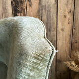 Green velvet tub chair