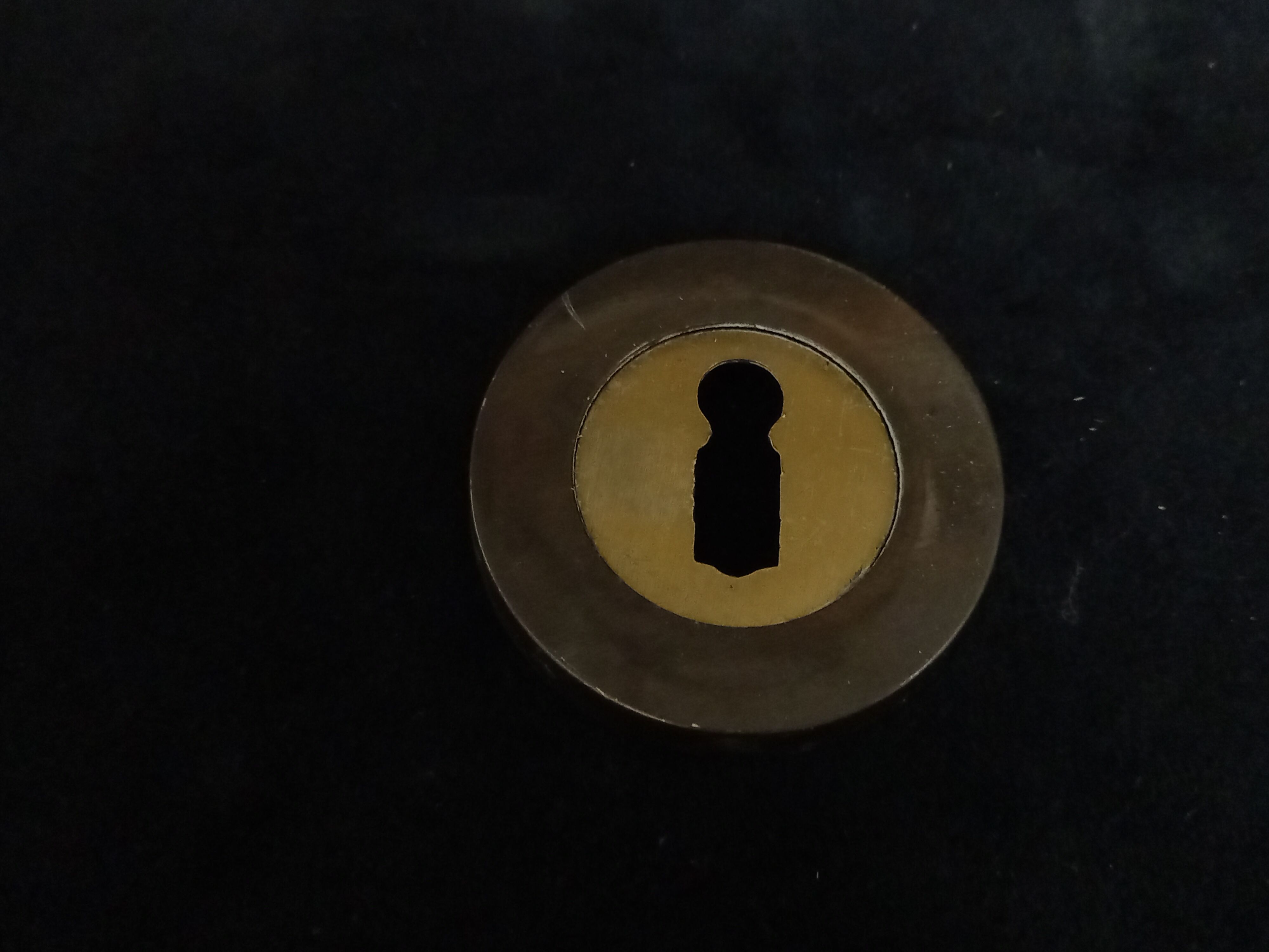 Four pairs of brass door handles with key plates