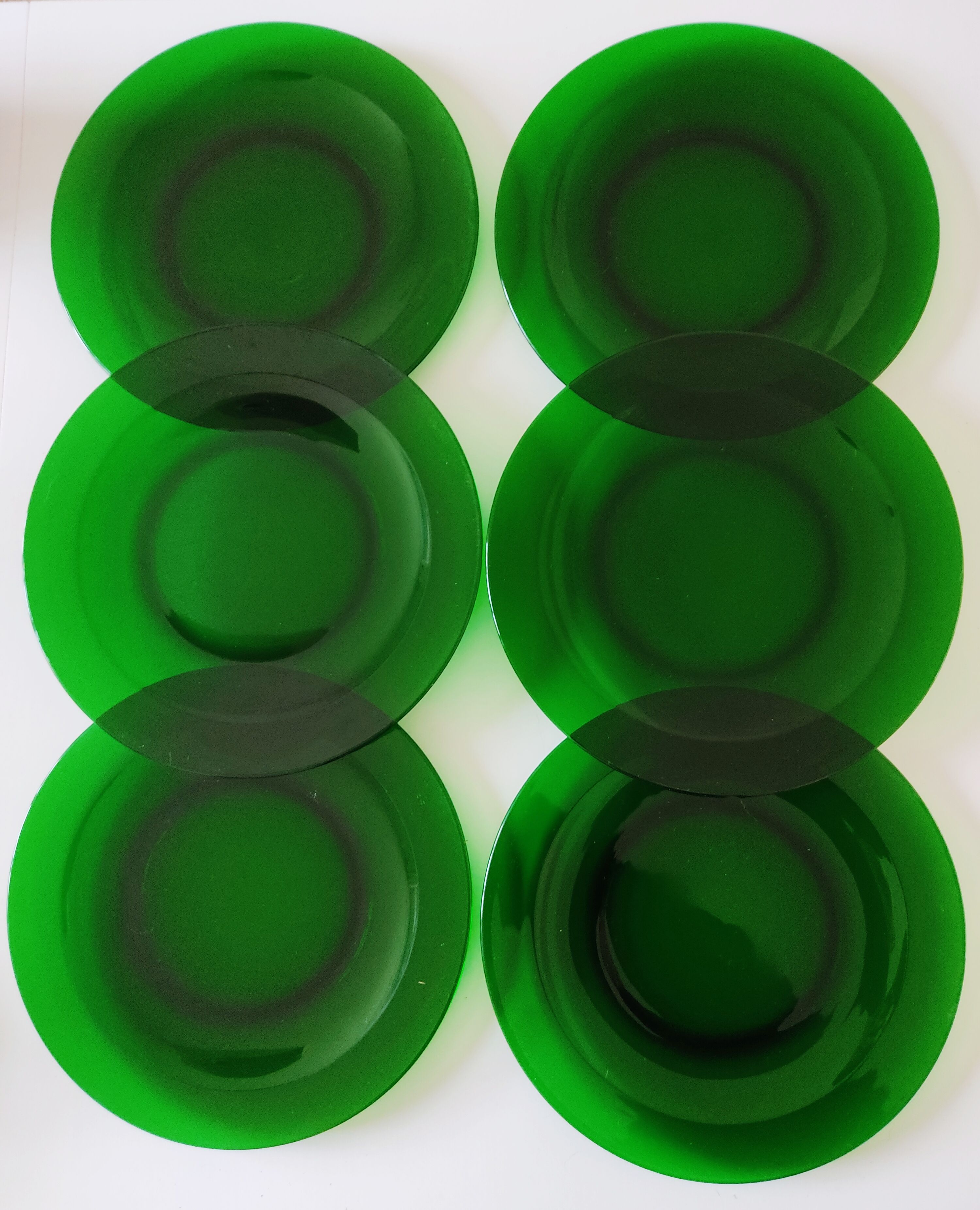 6 dishes in green glass