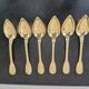 6 cuillères à café en métal doré