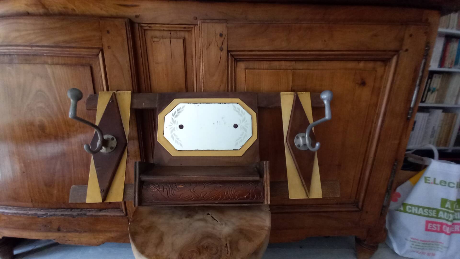 Vintage Art Deco wall coat rack in two-tone wood with engraved mirror.