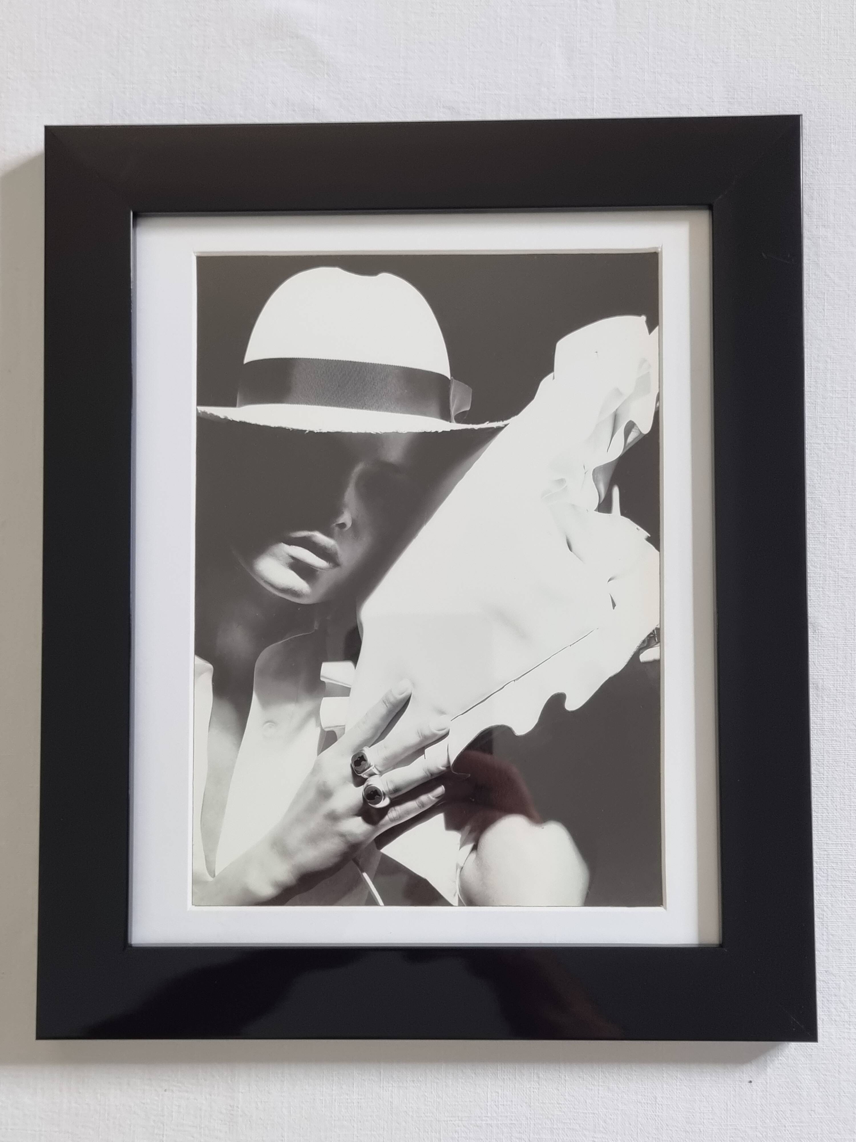 Framed black and white press photograph after Karl Lagerfeld, 30 x 26 cm