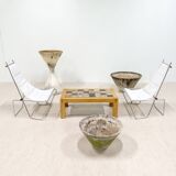 A pair of low chairs. France 70s