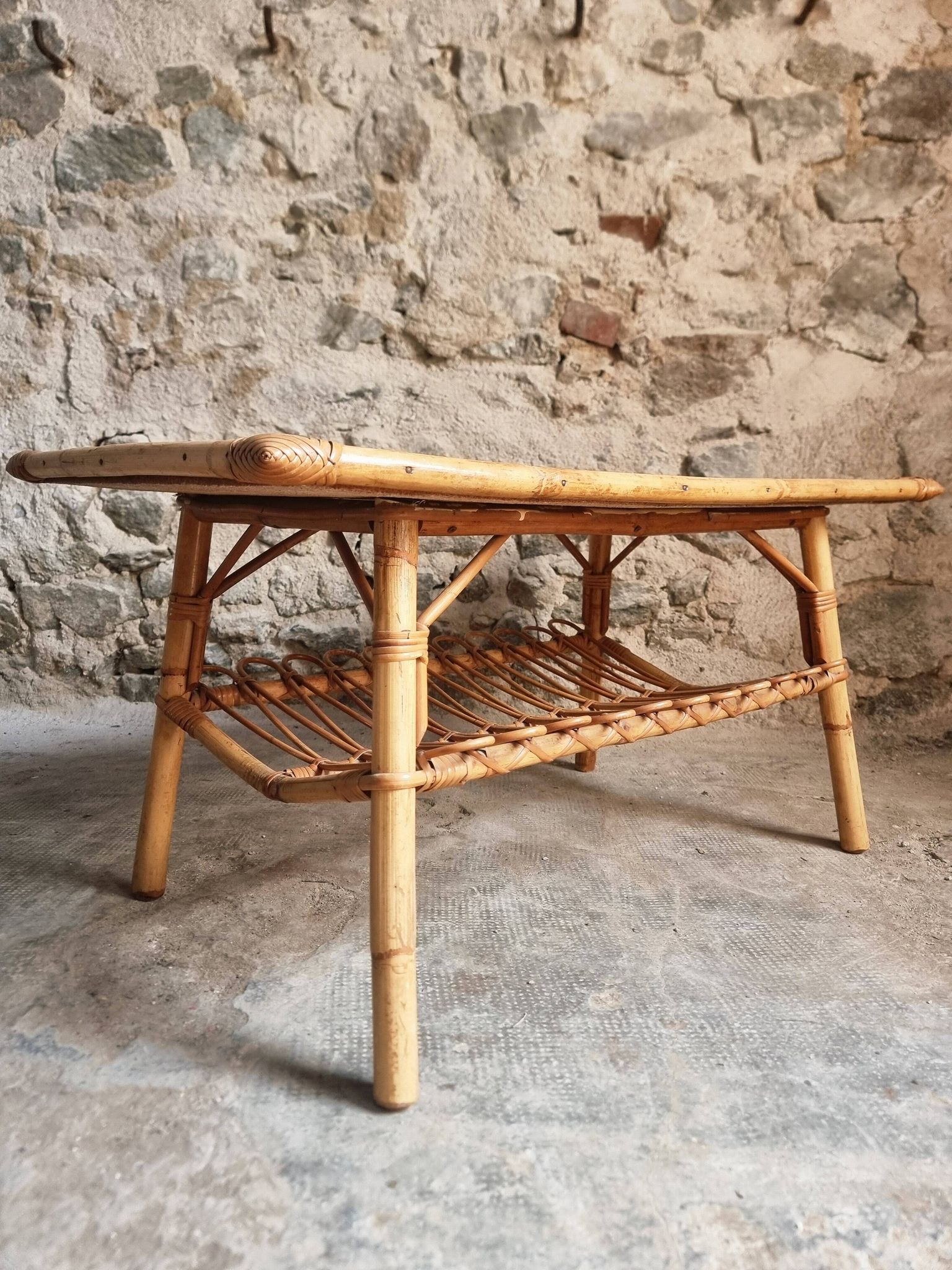 Vintage bamboo and rattan coffee table with magazine rack, French, circa 1960–1970.