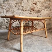 Vintage bamboo and rattan coffee table with magazine rack, French, circa 1960–1970.