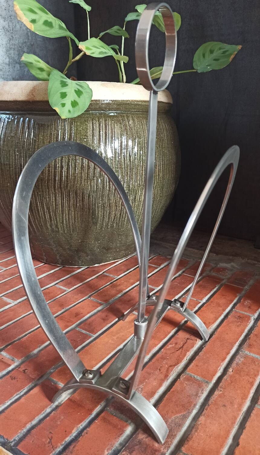 Porte-revues vintage en acier inoxydable brillant