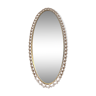 Golden iron oval mirror