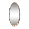 Golden iron oval mirror