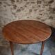 Antique round dining table in cherry wood, France, circa 1920.