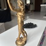Golden statue ferville suan