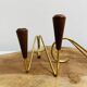 Pair of teak and brass candlesticks