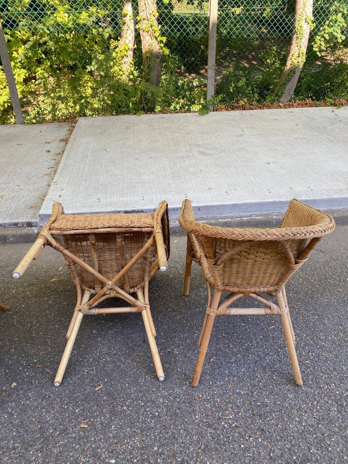 Rattan and woven wicker armchair in vintage bohemian style
