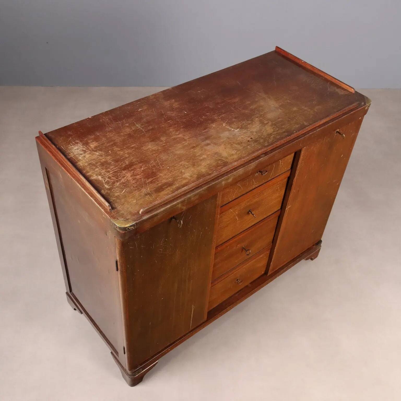 Antique mahogany commode with brass details, 4 drawers, 20th century.