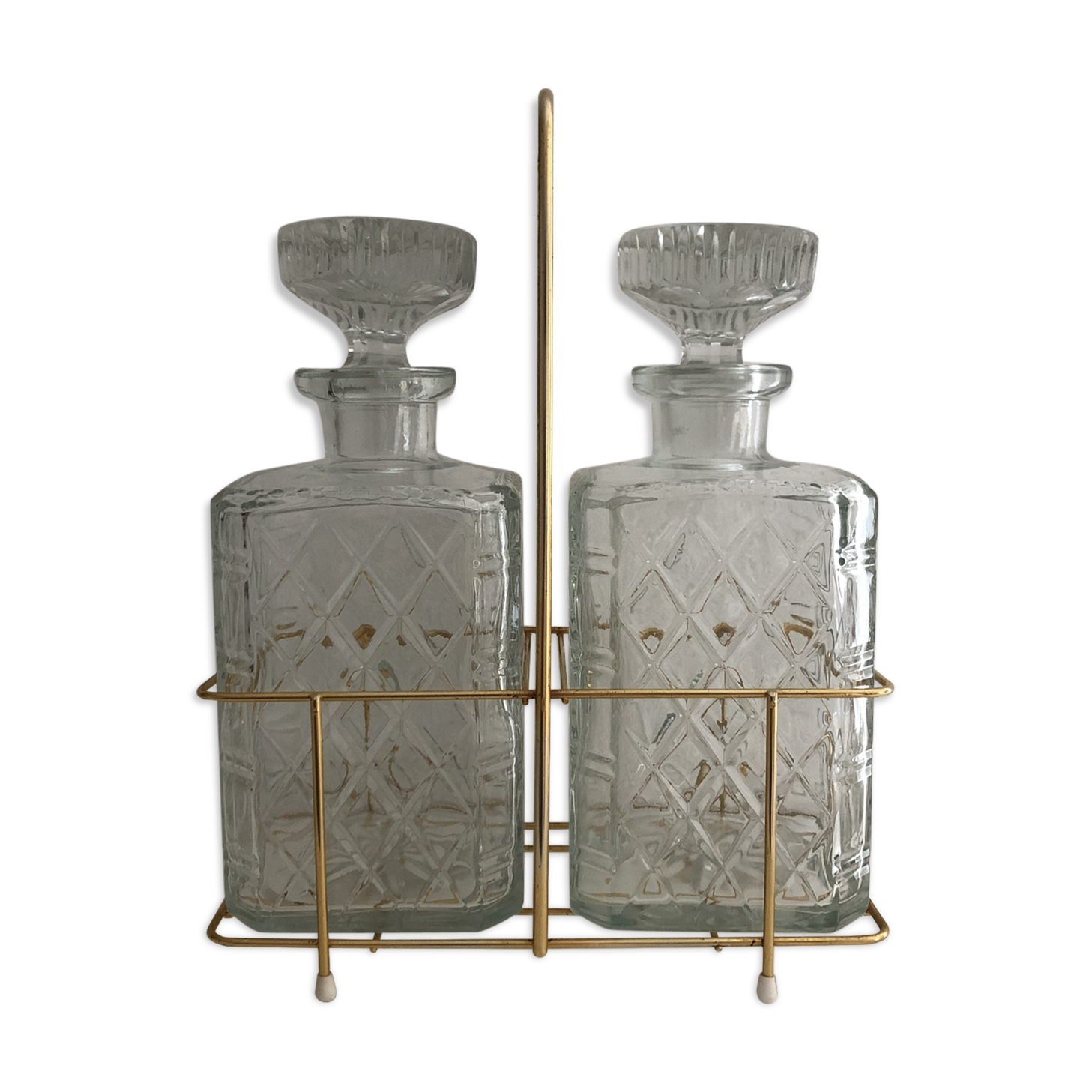 Pair of vintage decanters with brass basket