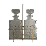 Pair of vintage decanters with brass basket