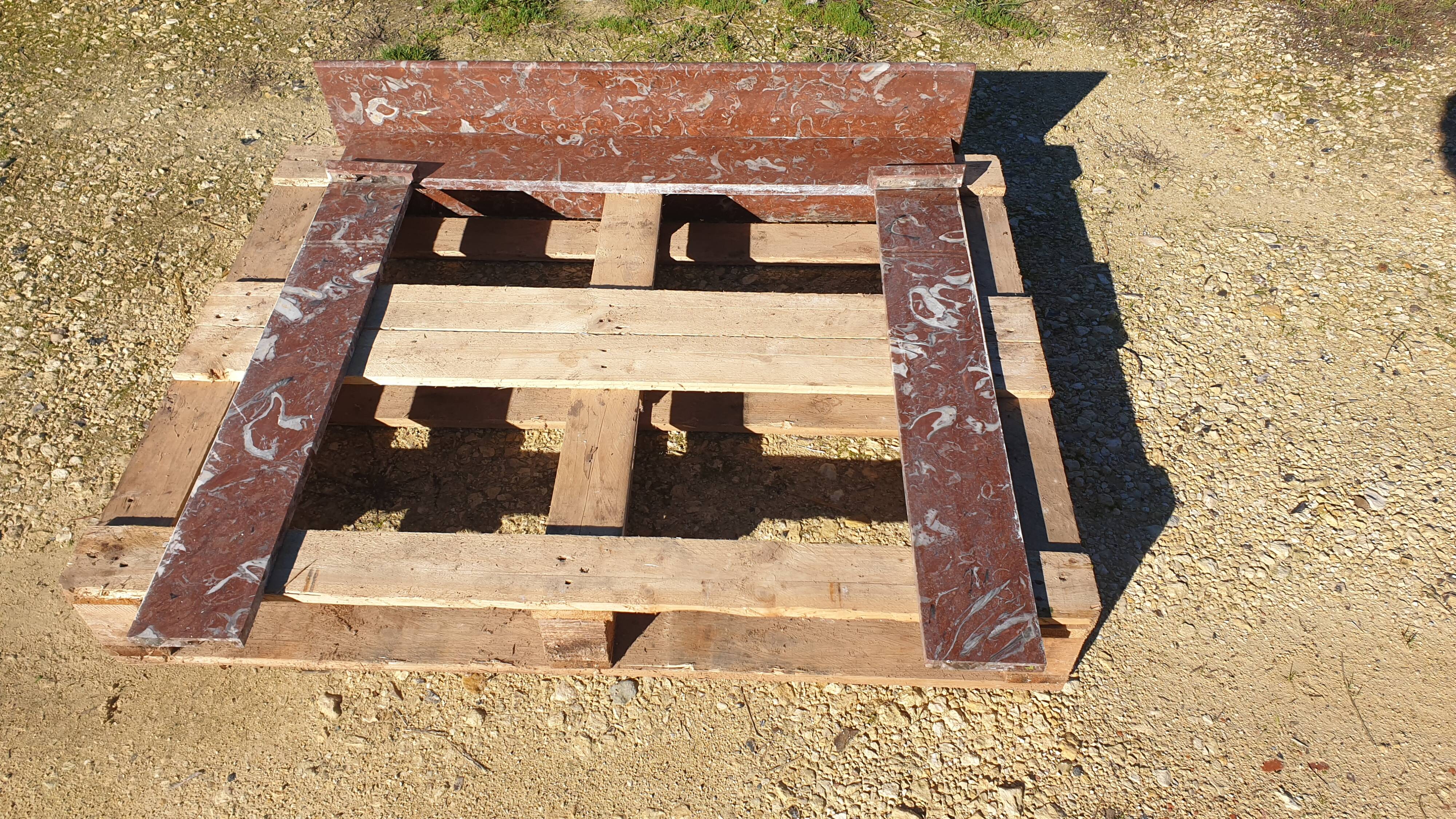Red marble fireplace surround - early 20th century