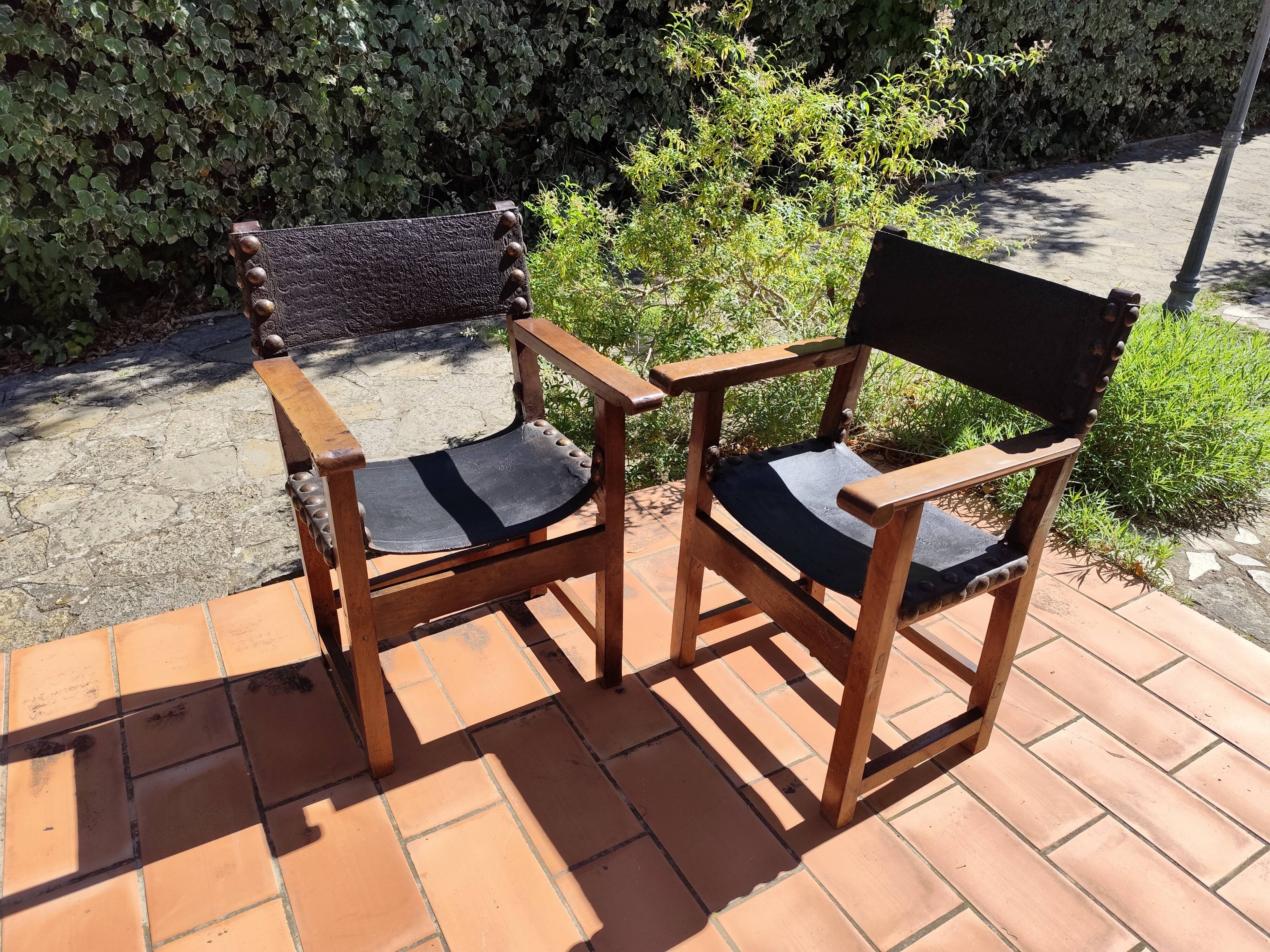 Pair of French Brutalist oak and leather armchairs 1920