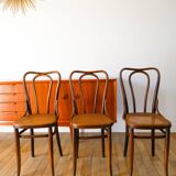 Set of 3 bistro chairs in wood and canework signed J. Kohn, Made in Austria, 20th century