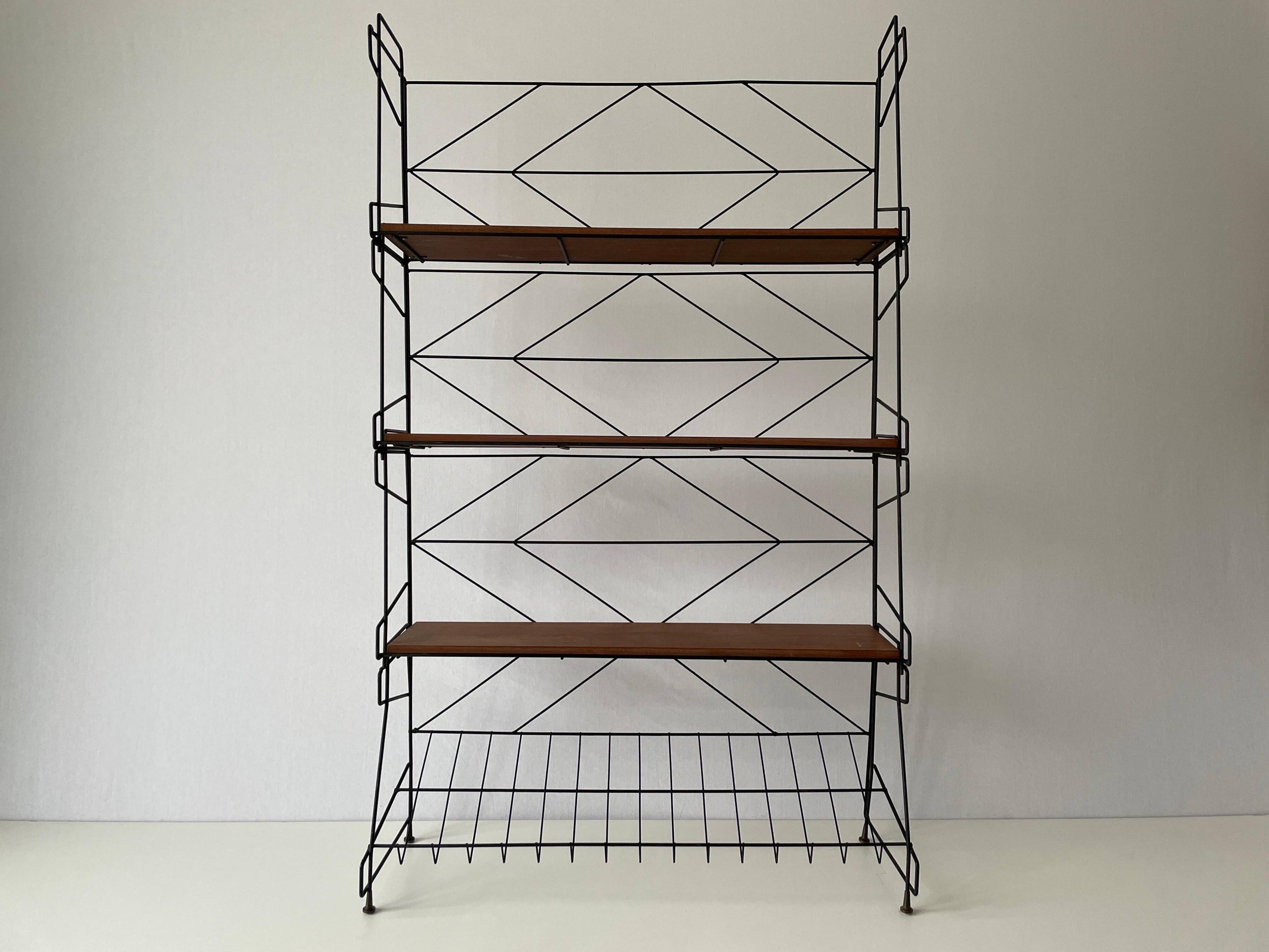 Free-standing shelf with a metal structure and 3 shelves, 1960s, Italy.