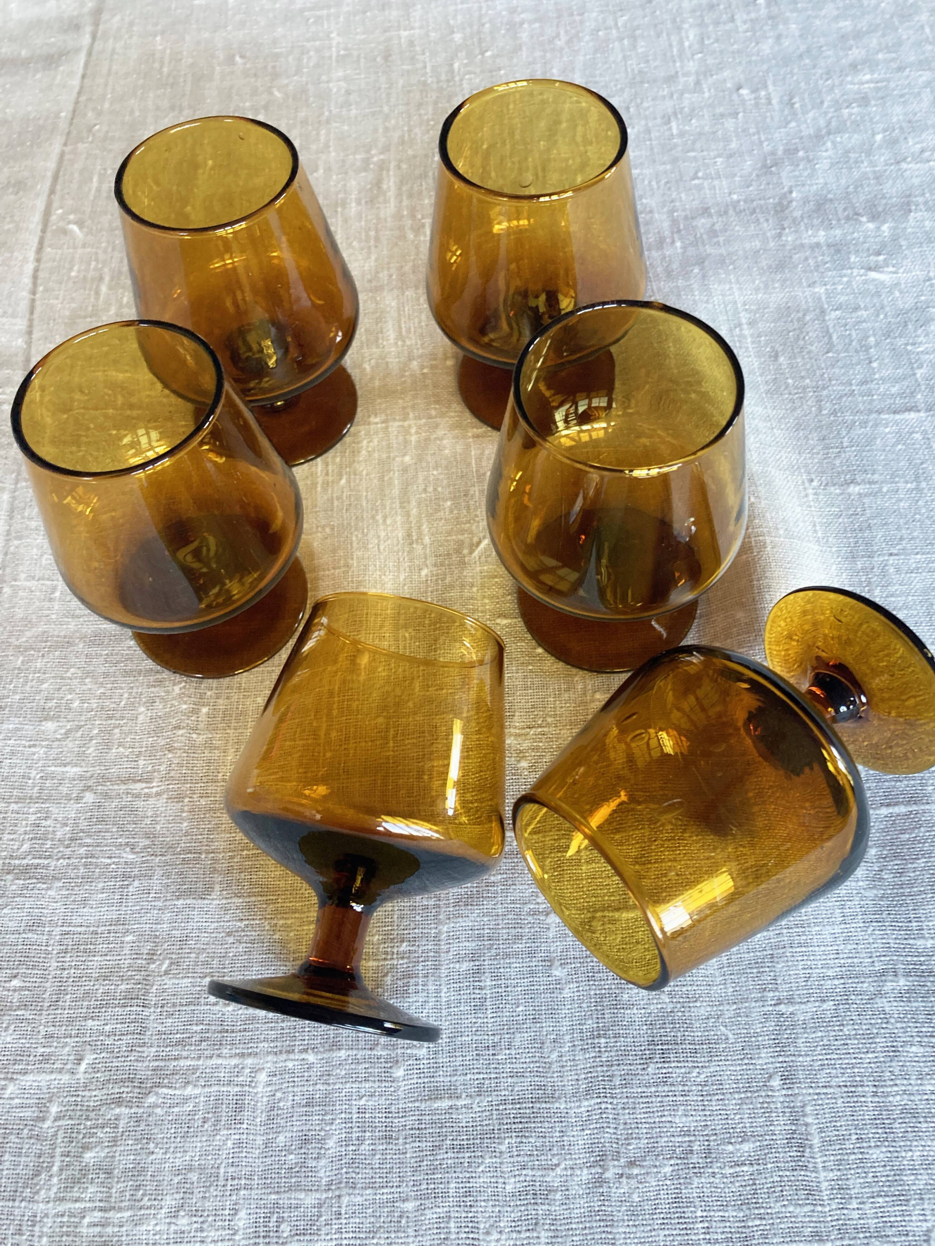 6 small amber glass stemmed glasses