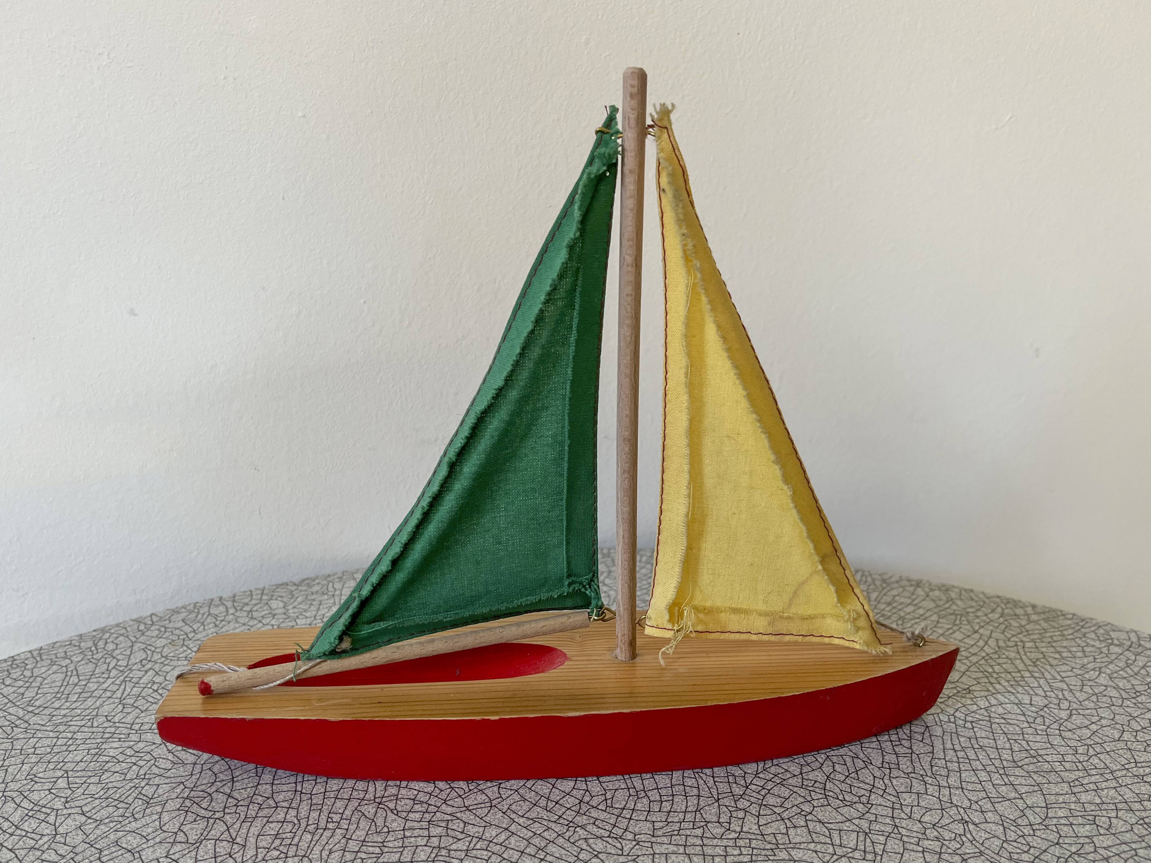 Navigable wooden basin sailboat. OGAS model made in Germany, 70s