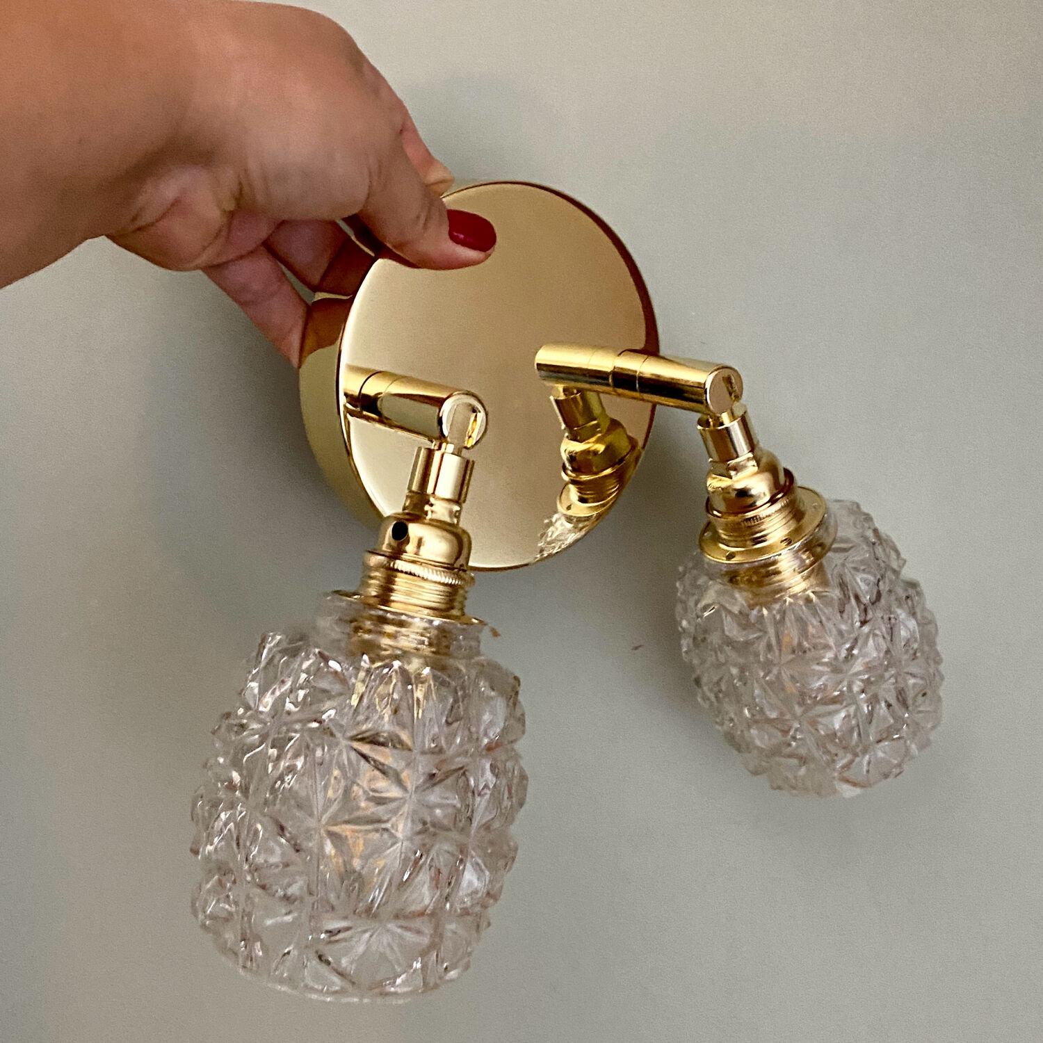 Double vintage tulip wall light in moulded glass.