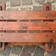 Rustic bench, old folk art, snow sled, Alps.