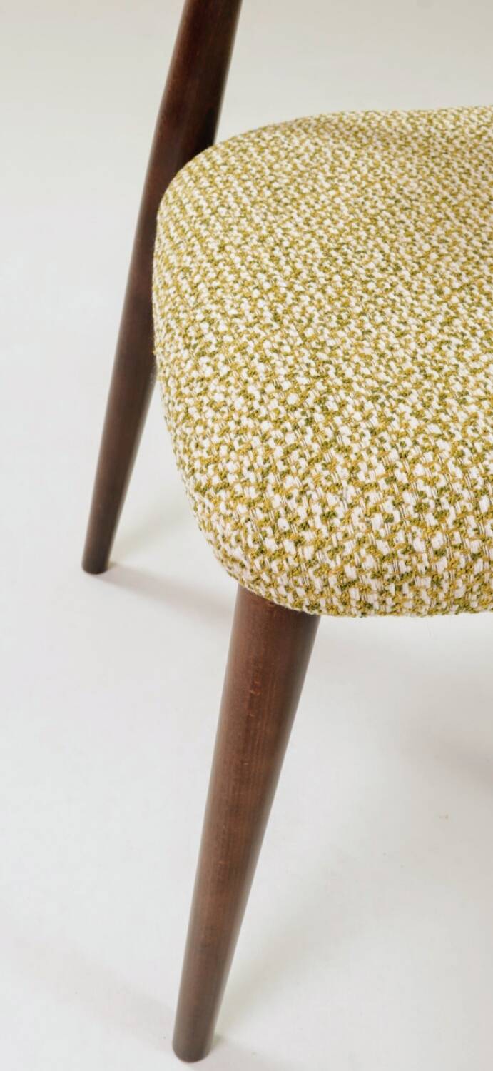 Green and walnut fabric dining chairs