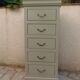 Louis-Philippe style chiffonnier in grey-green, wooden top.