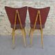 Pair of wooden chairs and red skai, 50s