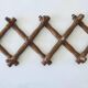 Old wooden wall coat rack