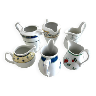 Set of 6 porcelain milk pots