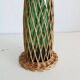 Glass and wicker bottle