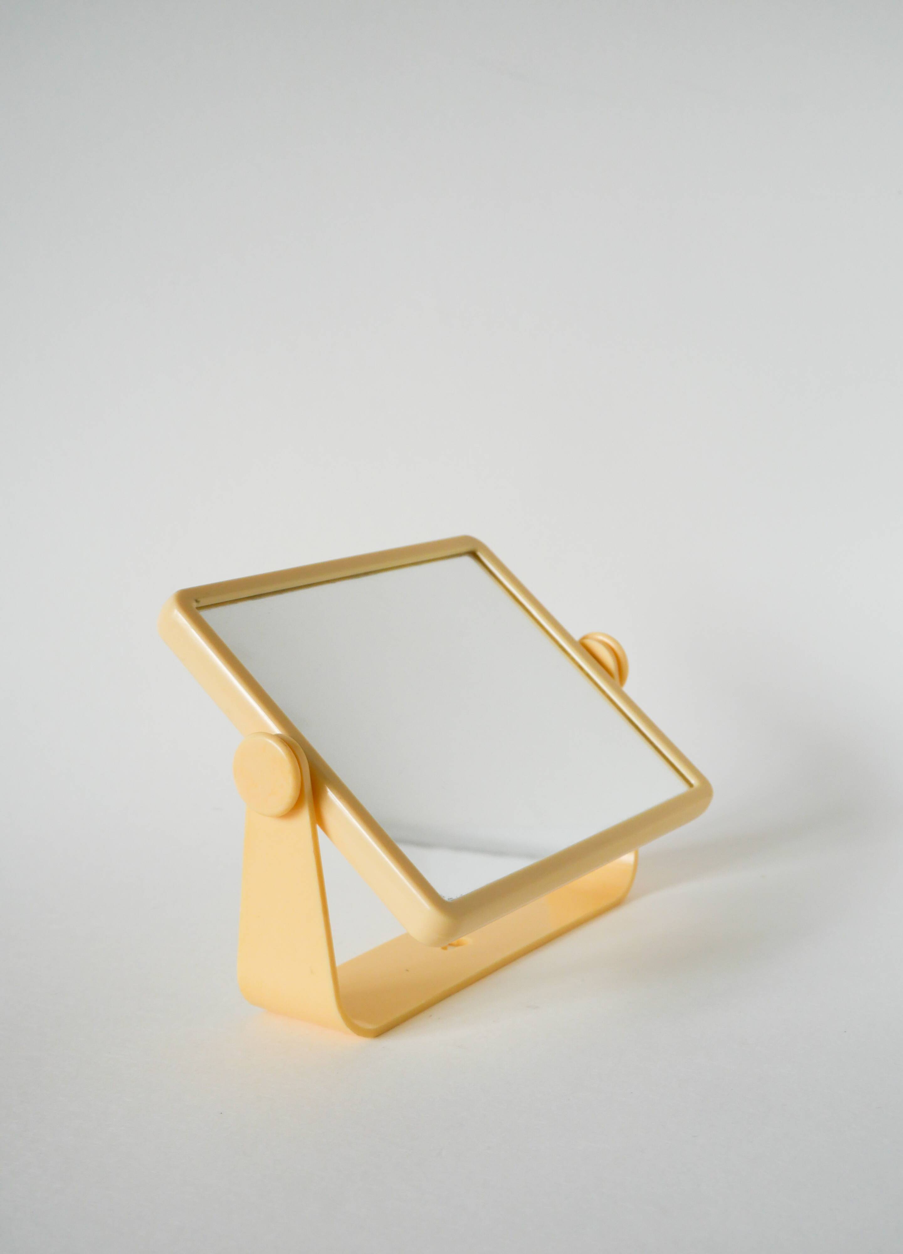 Small cream plastic bathroom mirror to attach, 1970s