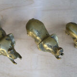 Three brass elephants