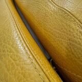 Fauteuil cuir jaune Rochebobois années 80/90
