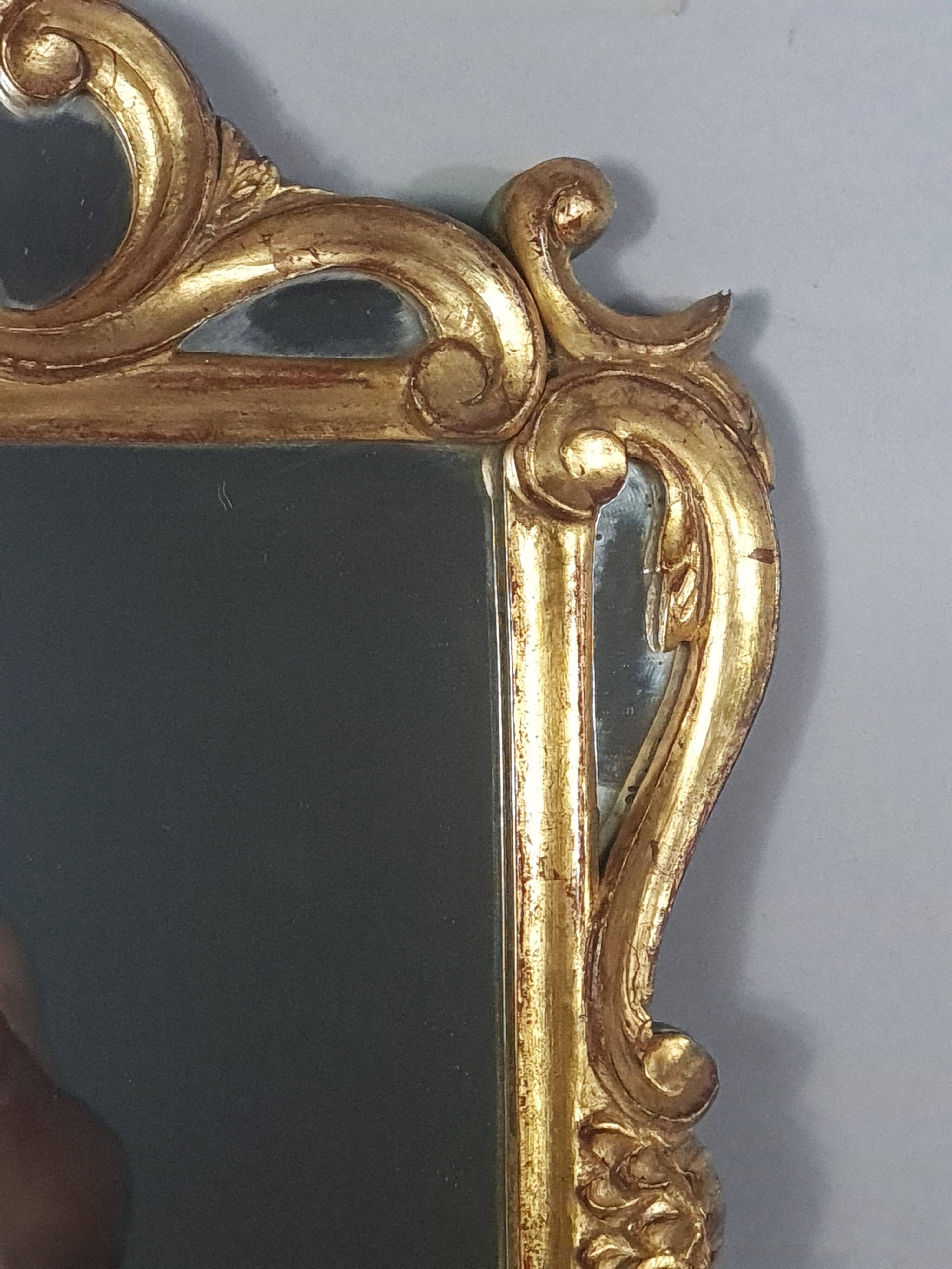 Antique mirror with carved wooden frame and original gilding, 53x37 cm, SD207.