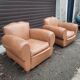 Pair of club chairs in skai