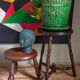 Low tripod stool in vintage turned solid wood