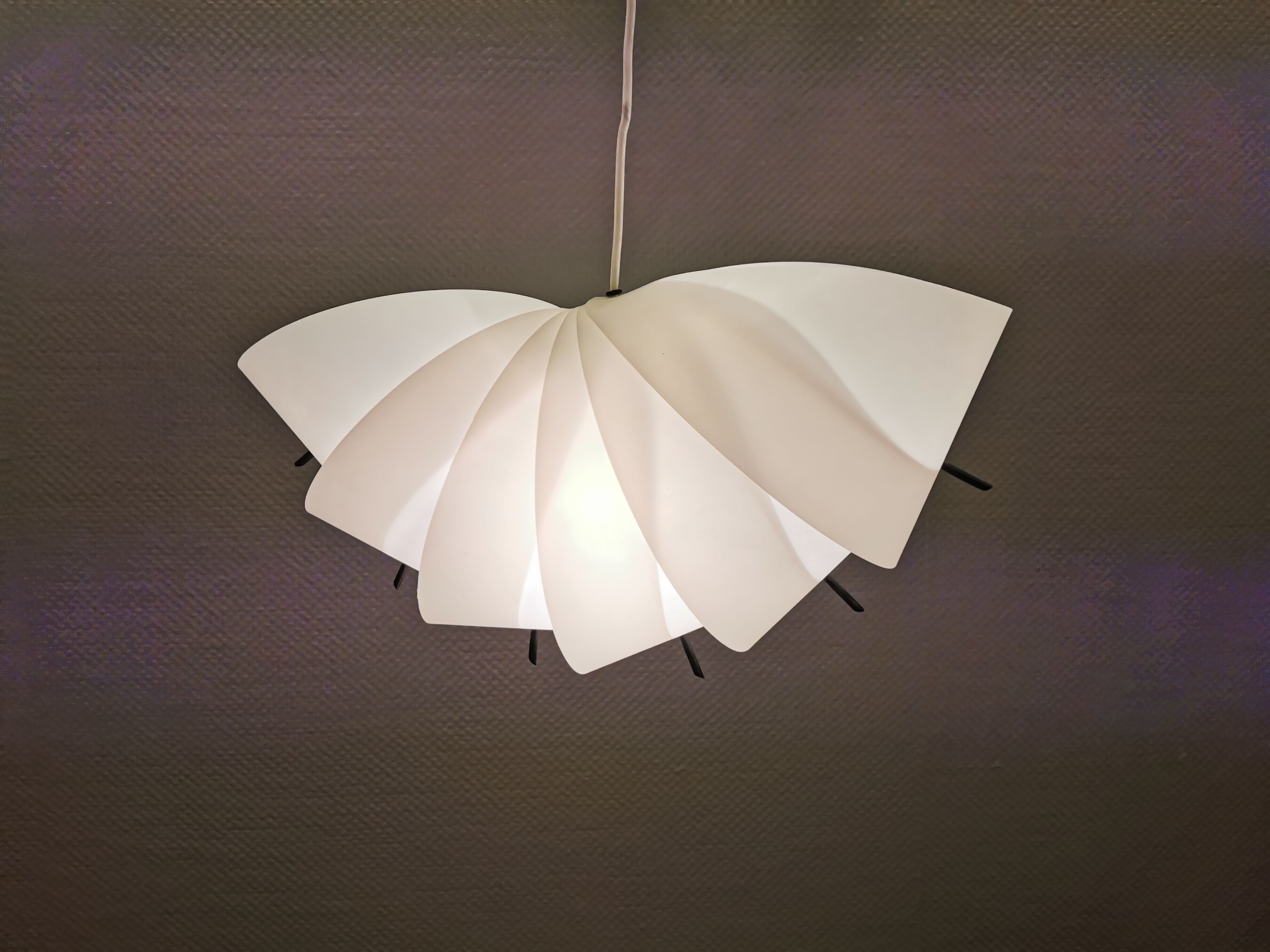 Danish conch, snail shell hanging lamp from the 80s, made of hard ABS plastic.