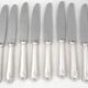 Ercuis Trianon, Rubans, 12 silver-plated table knives, excellent condition.