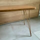 Table basse vintage 1960 Formica teck et pieds laiton