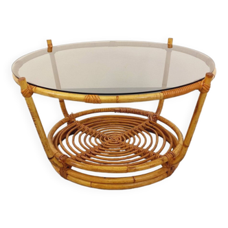 Vintage round coffee table in smoked glass and rattan from the 70s