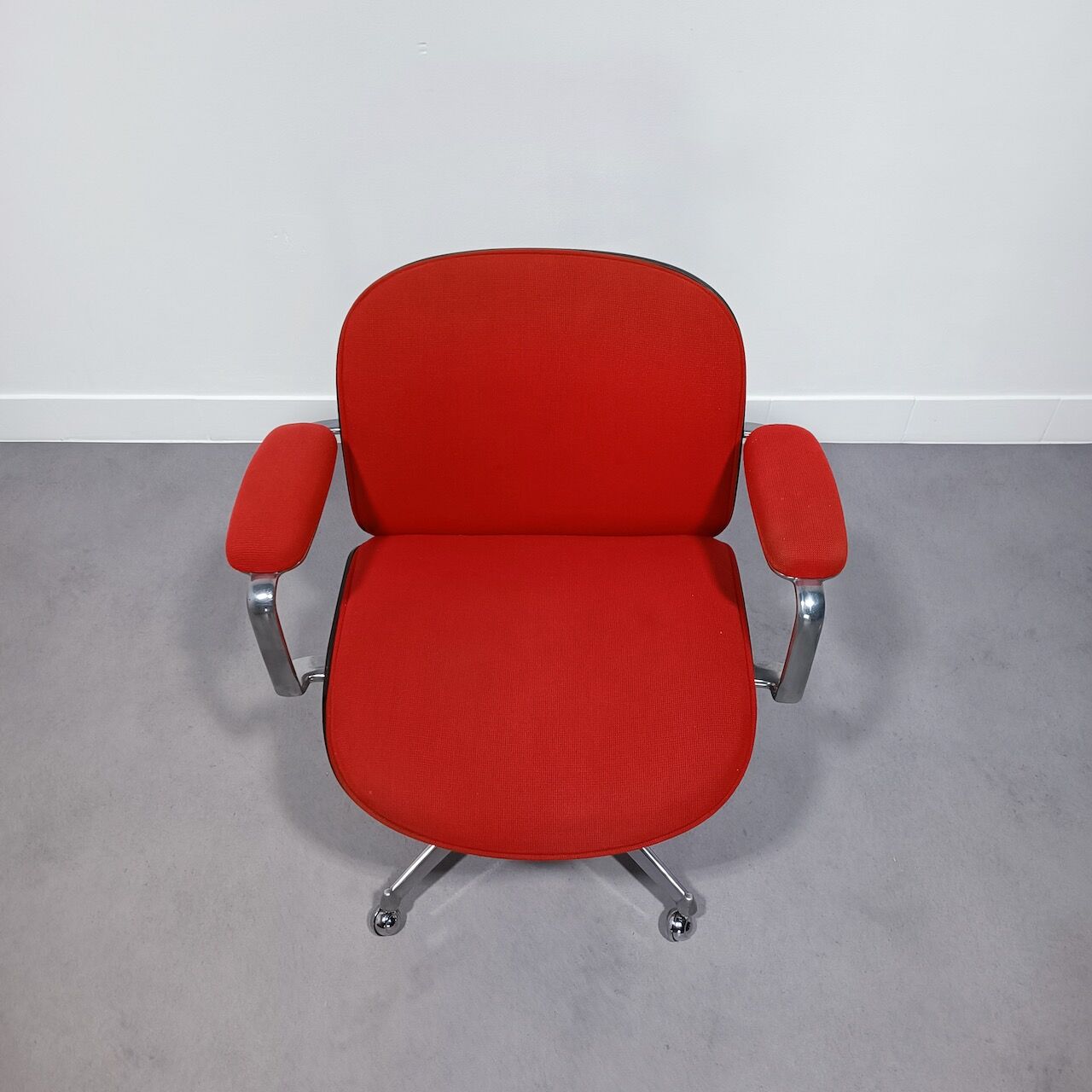 Red office chair by Parisi/Mim