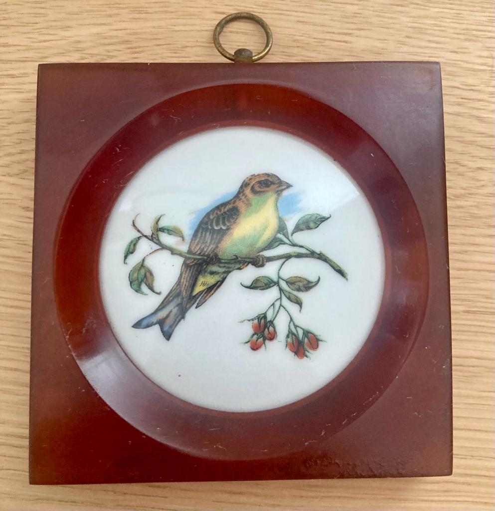 Porcelain and bakelite frame