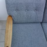 Three seater sofa in fabric and wood
