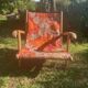 Vintage beach or garden chair made of wood and floral fabric, 1970s.