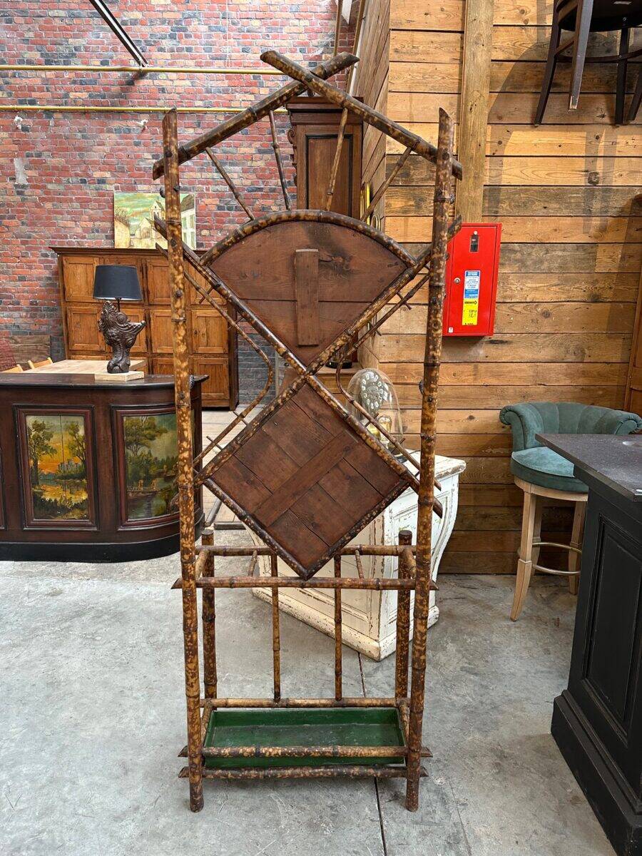 Entrance hall wardrobe in bamboo and rattan from the early 20th century.