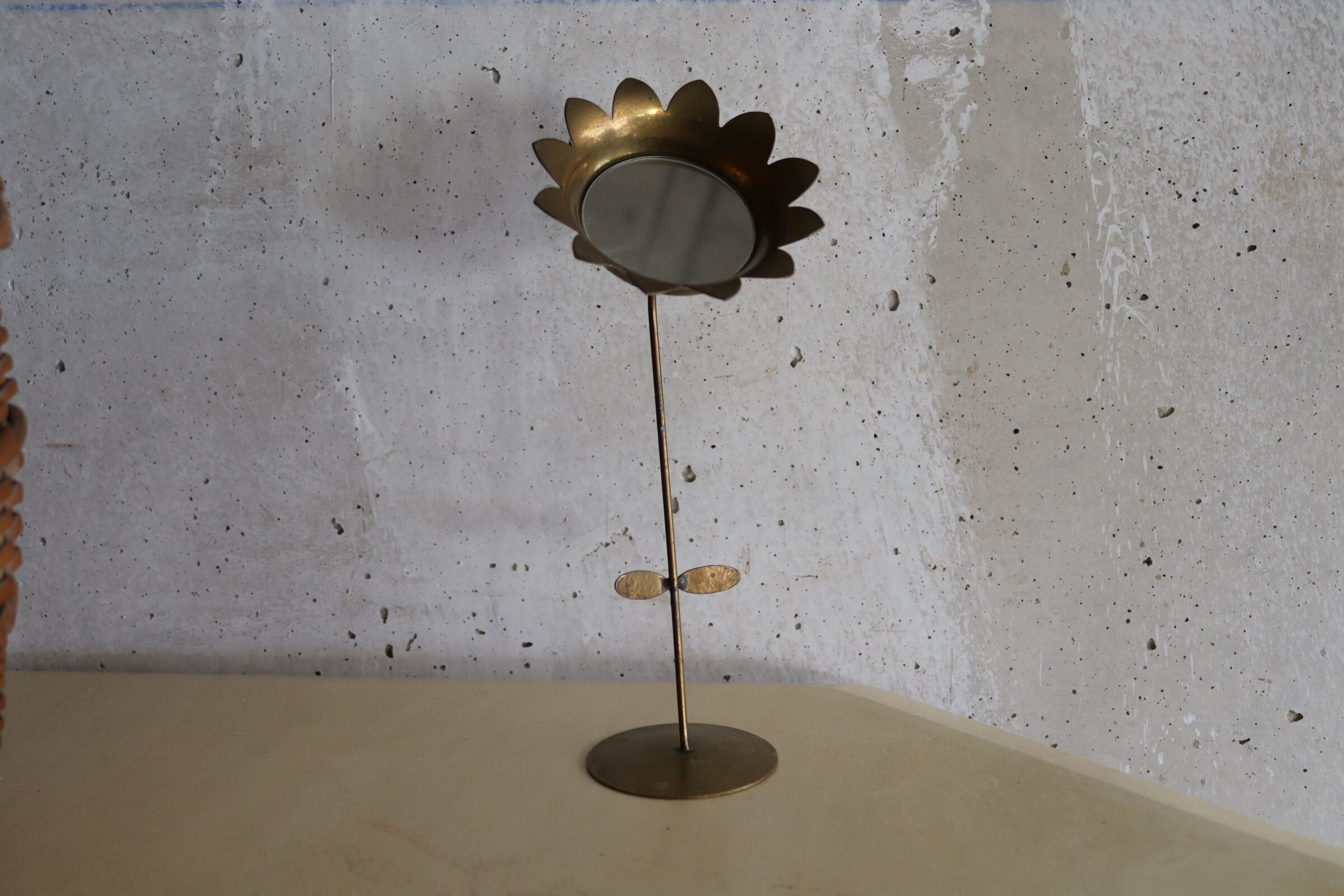Vintage flower-shaped mirror
