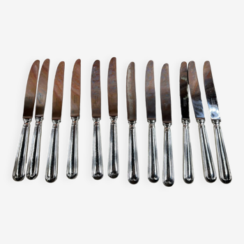 12 couteaux de table en métal argenté, François Frionnet